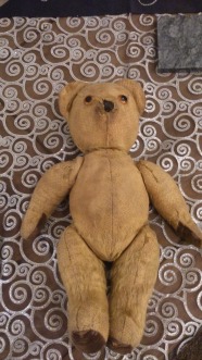 50 Year Old Teddy Bear laying down
