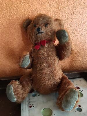 old bear with movable arms and legs