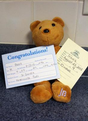 Light Brown Teddy Bear with JB on left foot