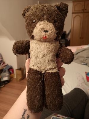 Brown and white teddy bear