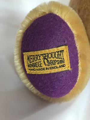 label on teddy bear foot