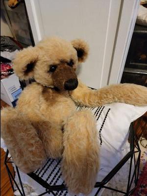 Peddlers mall teddy bear with thoughtful eyes