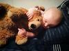 baby with teddy bear