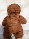 back view of dark brown teddy bear