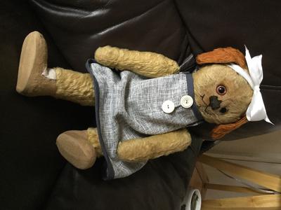 teddy bear with blue dress