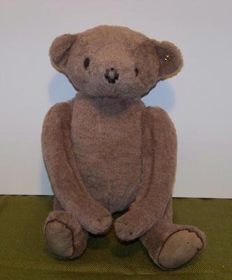 Jointed bear with button