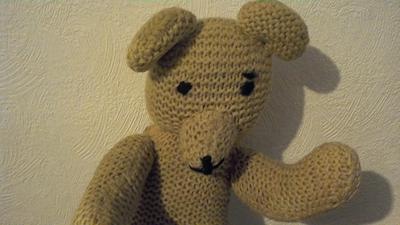 face of old teddy bear