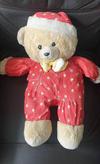 Teddy bear in red pajamas