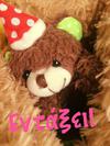 smal teddy bear with red hat
